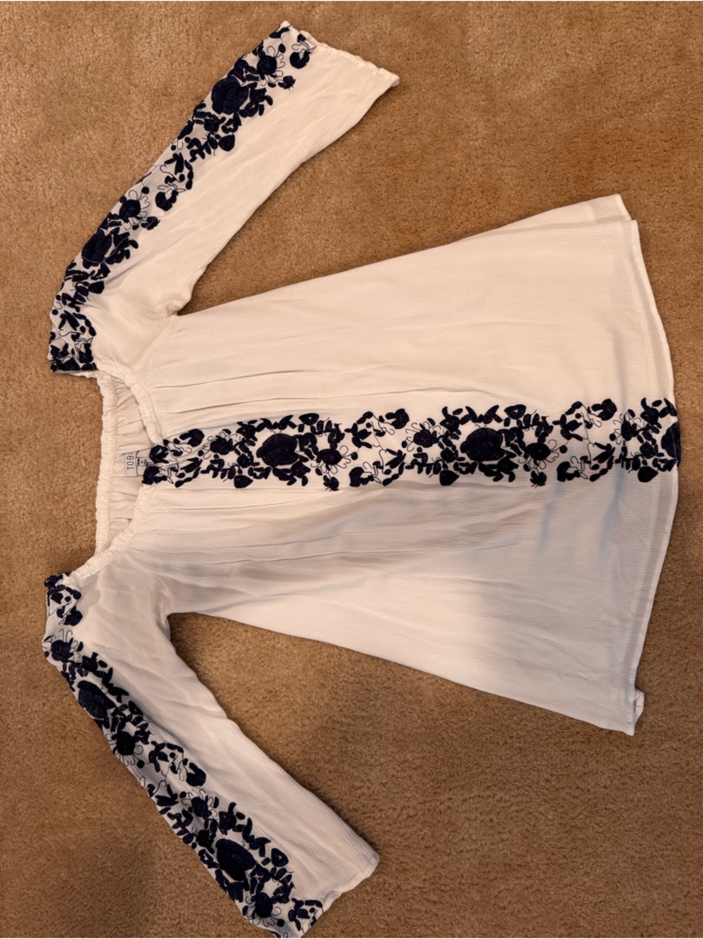 Tobi White Off-Shoulder Top with Navy Floral Embroidery